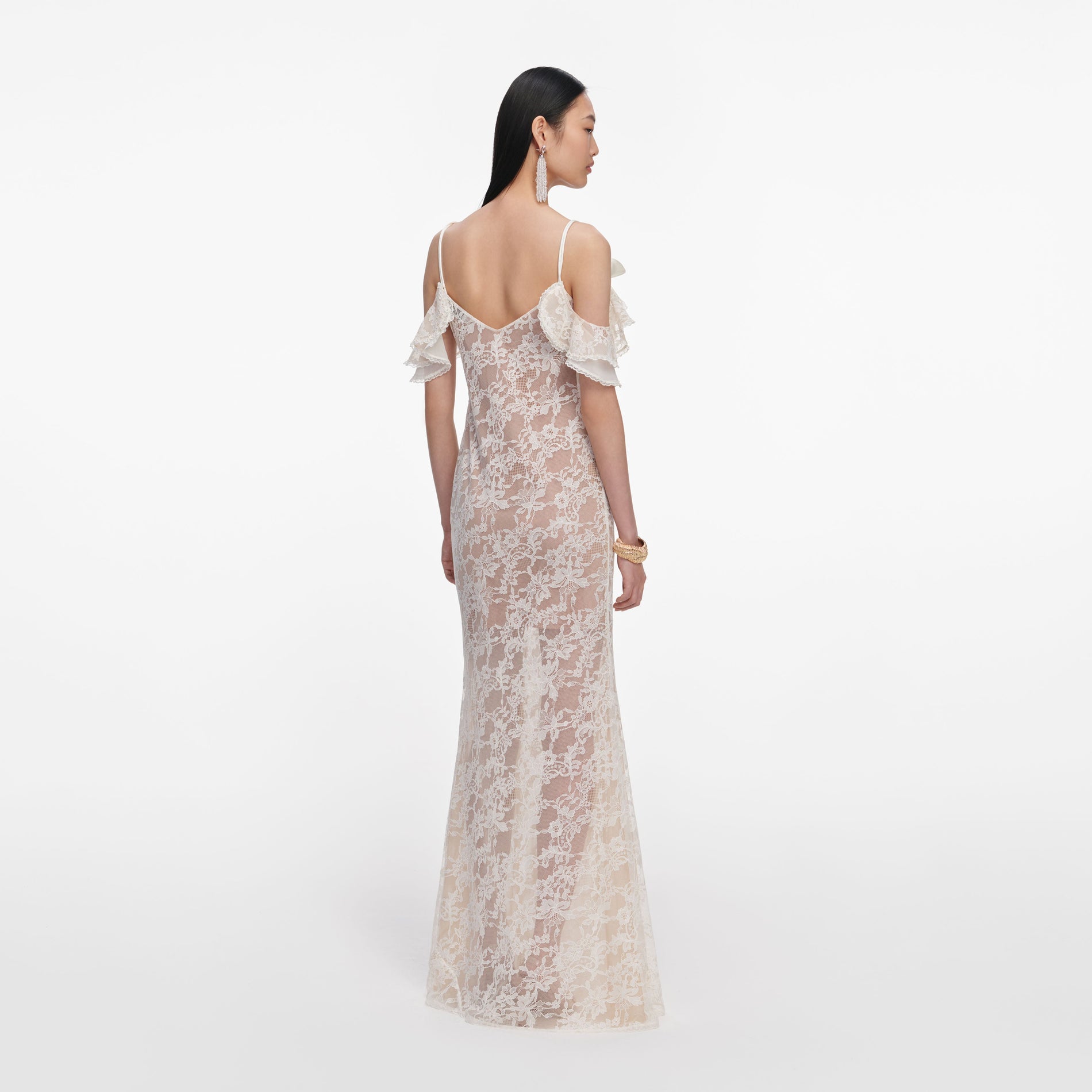 Back view of a woman wearing the Cream Lace Flower Maxi Dress
