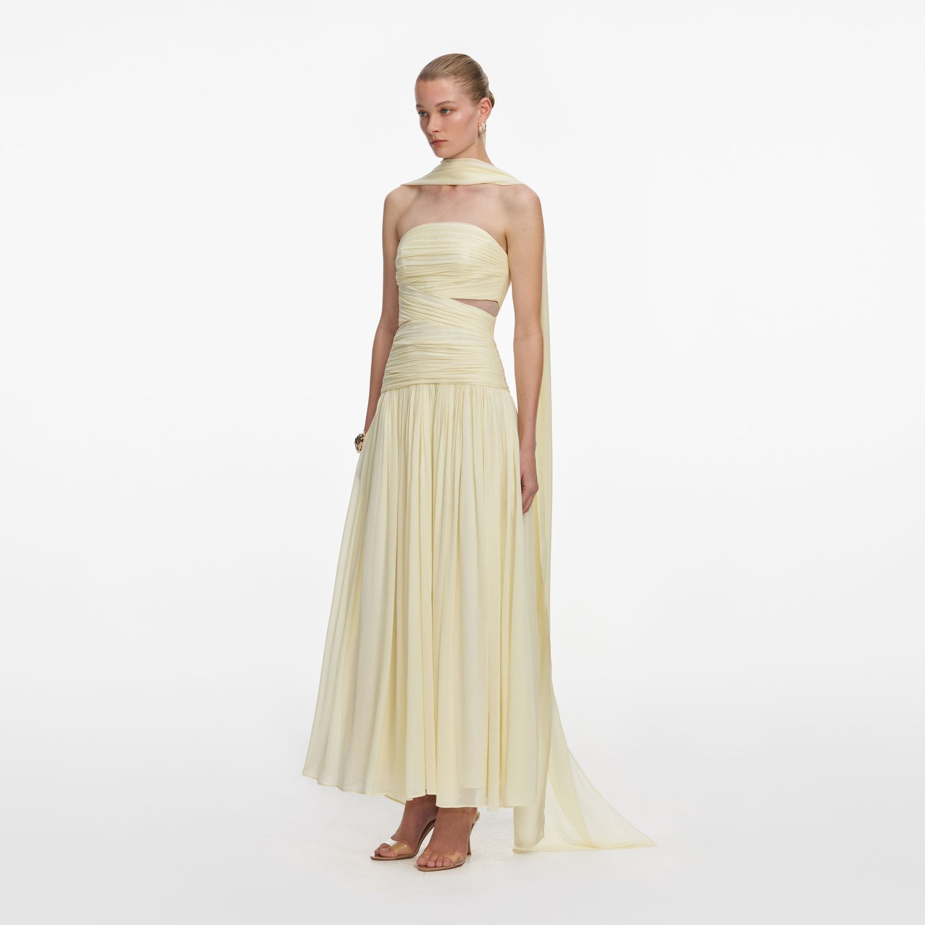 Side view of a woman wearing the Yellow Georgette Scarf Midi Dress