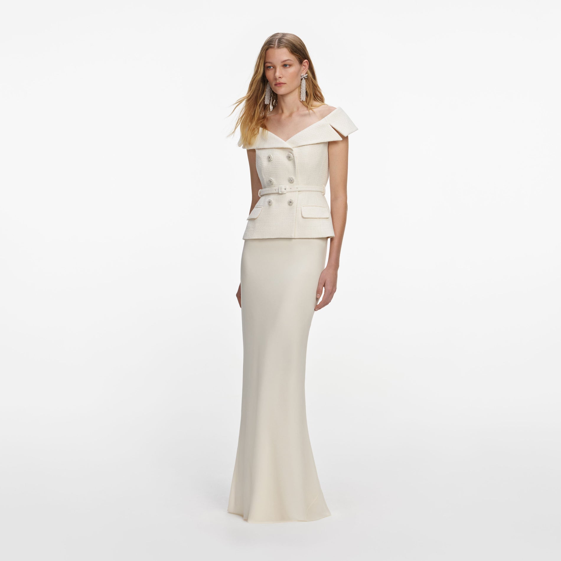 Side view of a woman wearing the Cream Boucle Maxi Dress