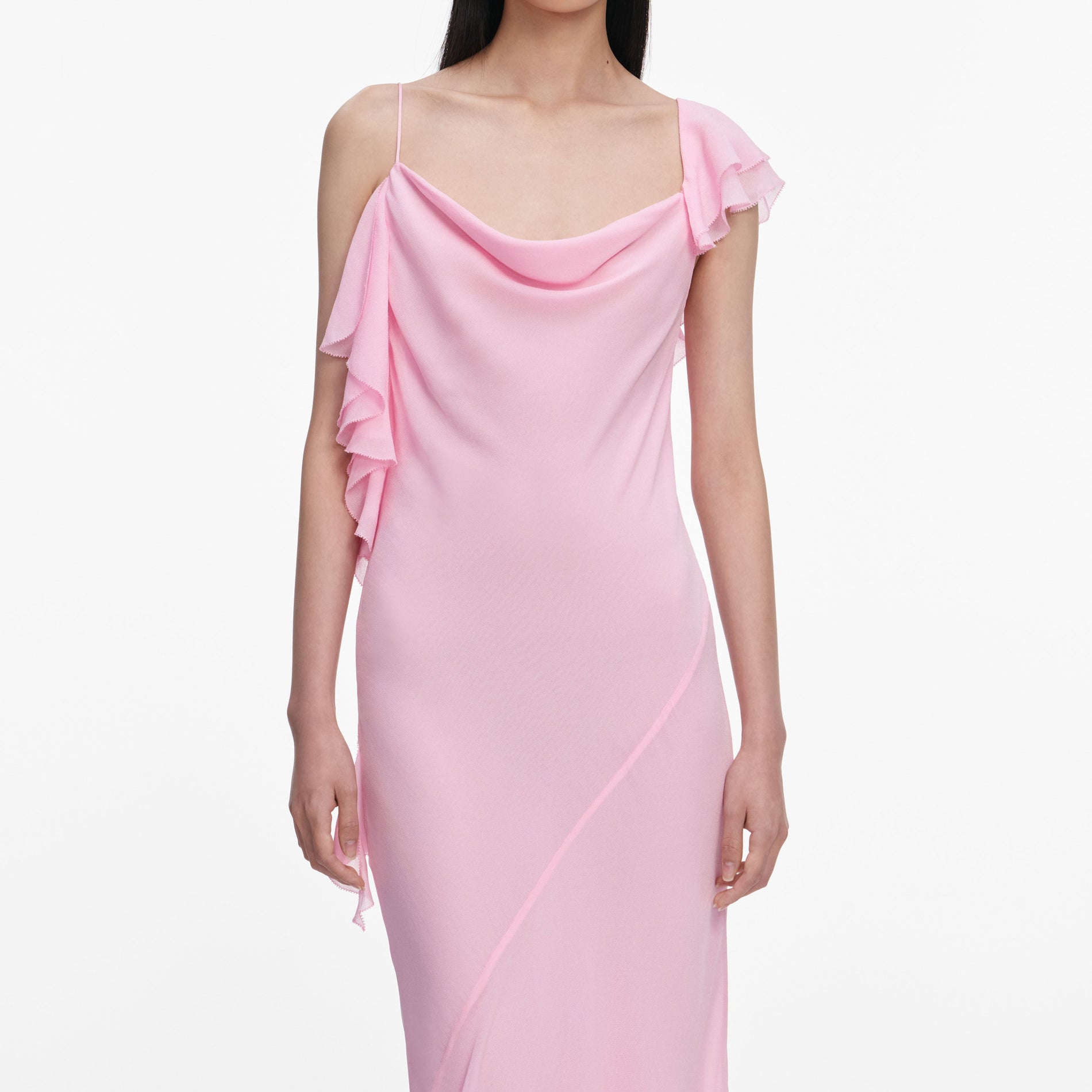 A close up of a woman wearing the Pink Georgette Frill Maxi Dress