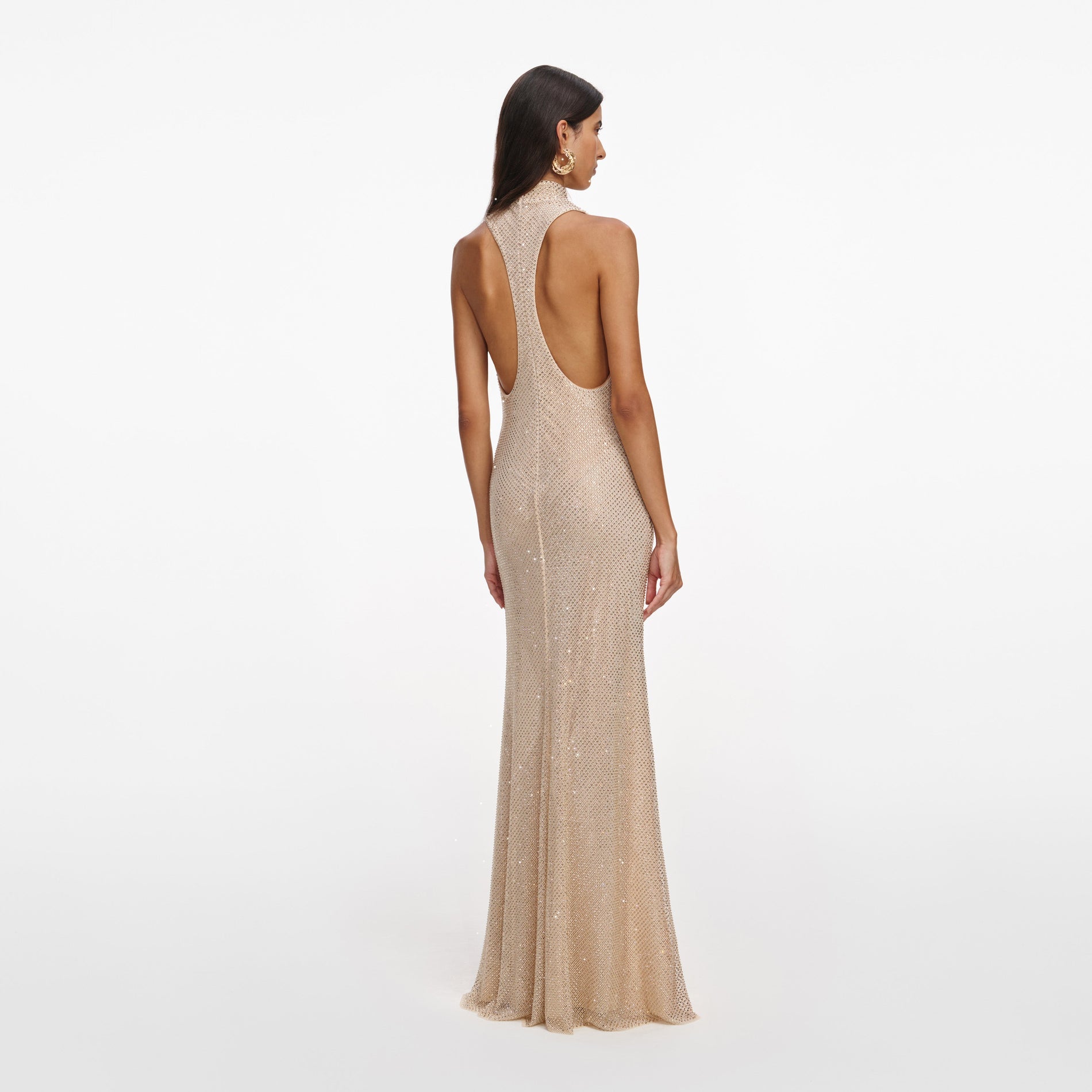 Back view of a woman wearing the Champagne Rhinestone Racer Back Maxi Dress