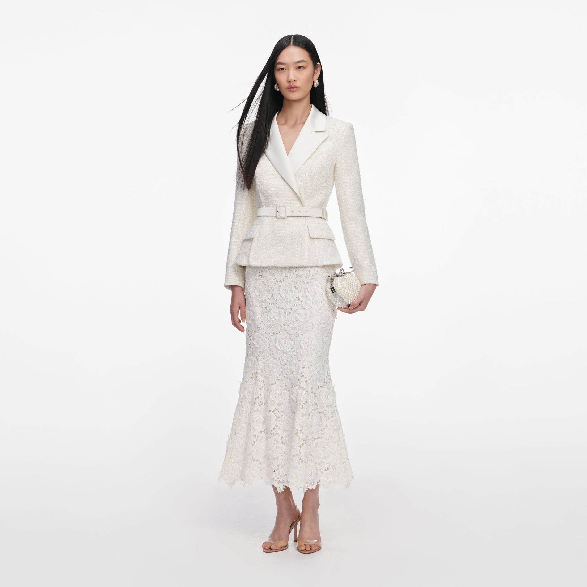 Side view of a woman wearing the Cream Boucle Flower Lace Midi Dress