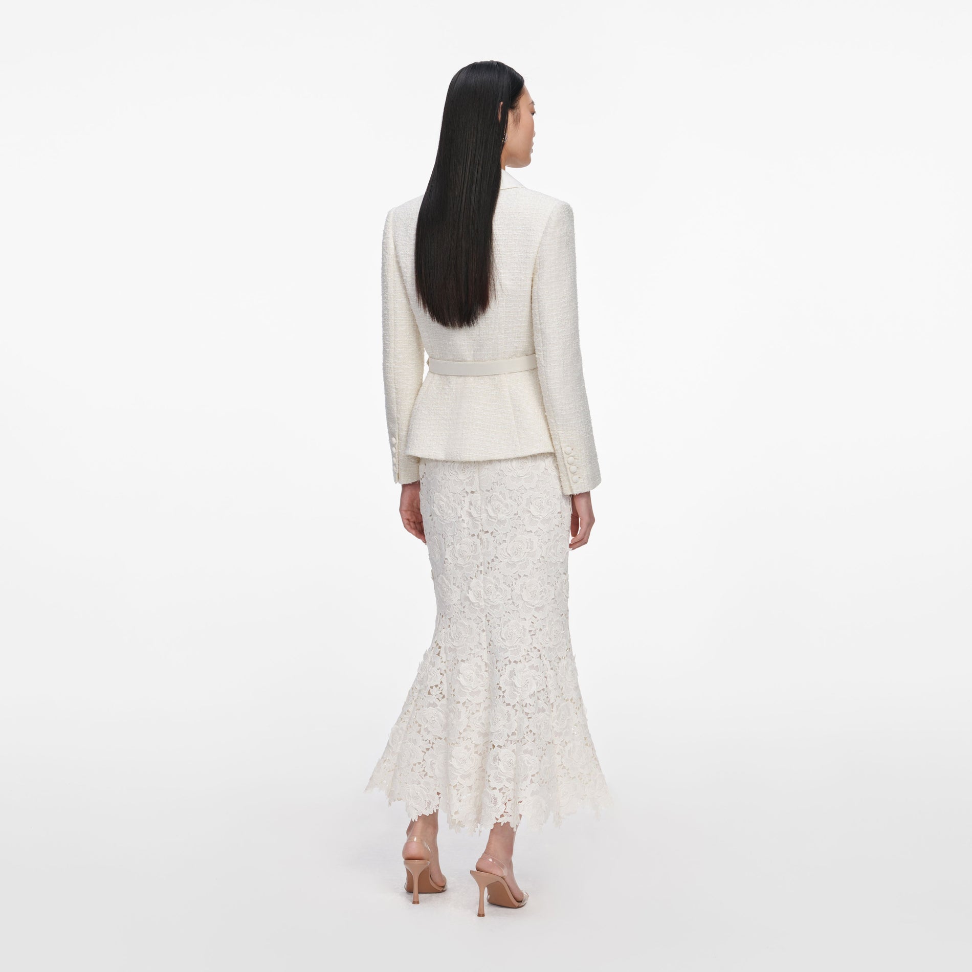 Back view of a woman wearing the Cream Boucle Flower Lace Midi Dress