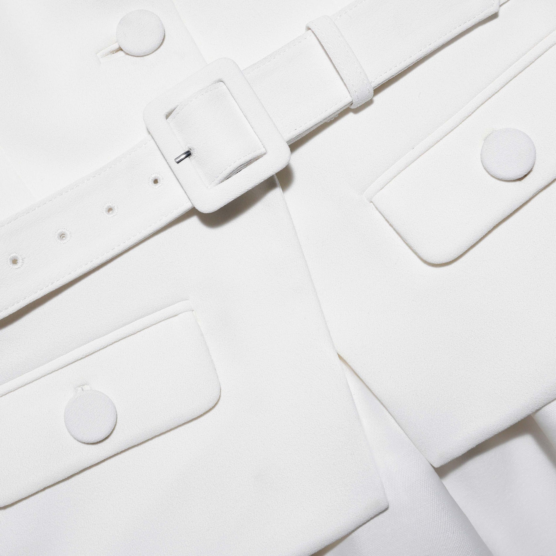 A close up of the fabric for the White Tailored Taffeta Midi Dress