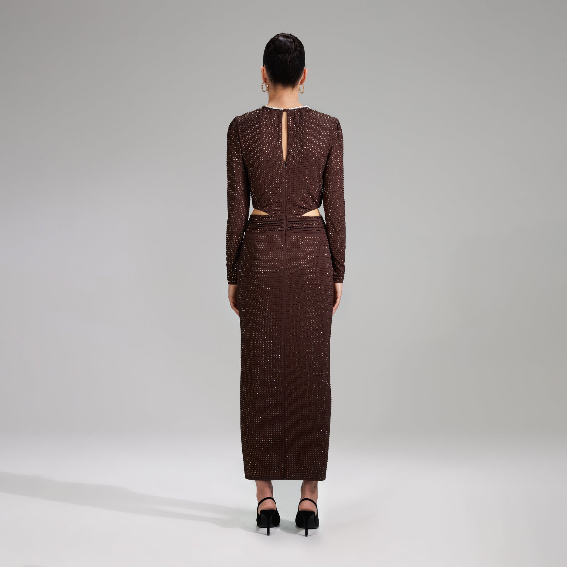 A woman wearing the Brown Rhinestone Midi Dress
