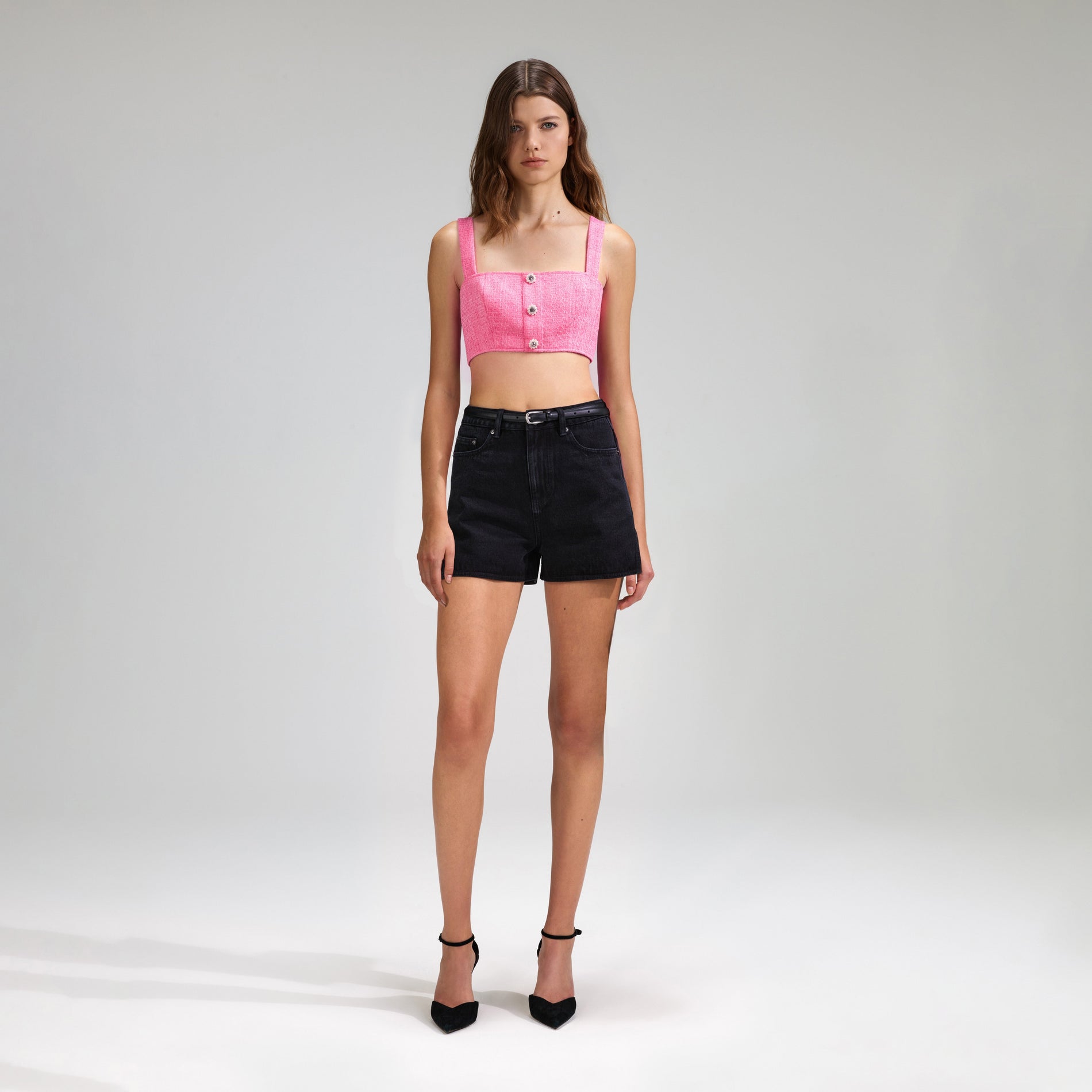 A woman wearing the Pink Boucle Square Neck Crop Top